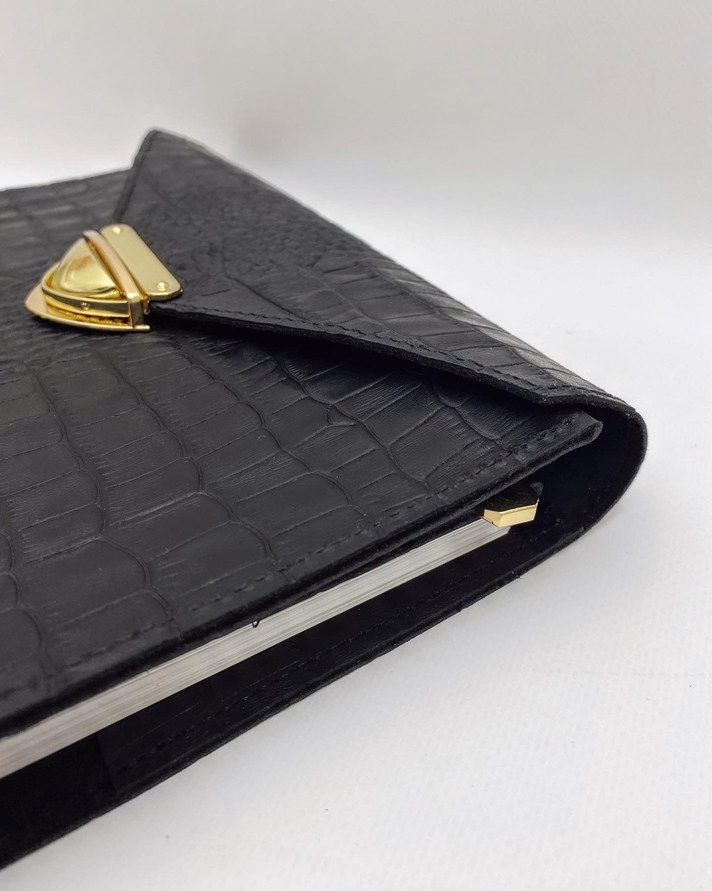 Very black matte croco leather. Format A5.