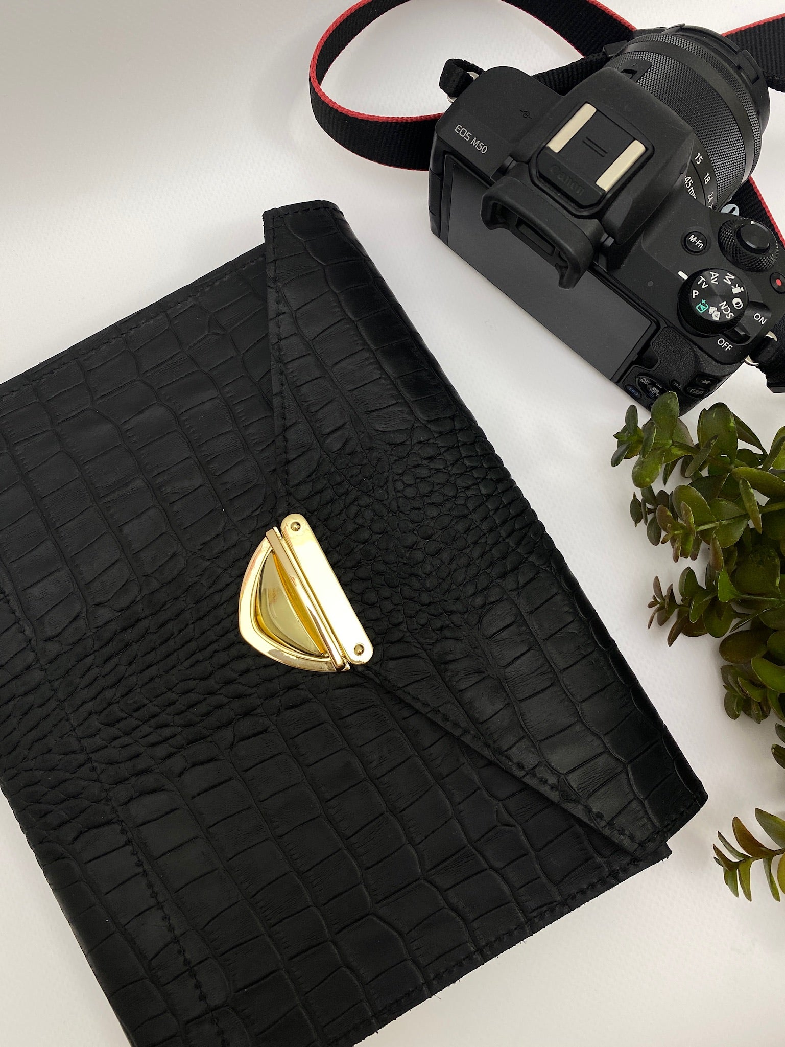 Very black matte croco leather. Format A5.