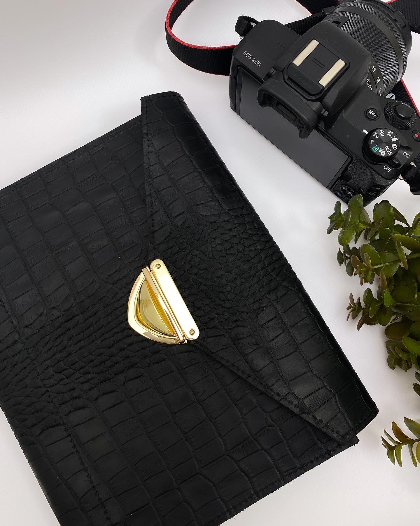 Very black matte croco leather. Format A5.