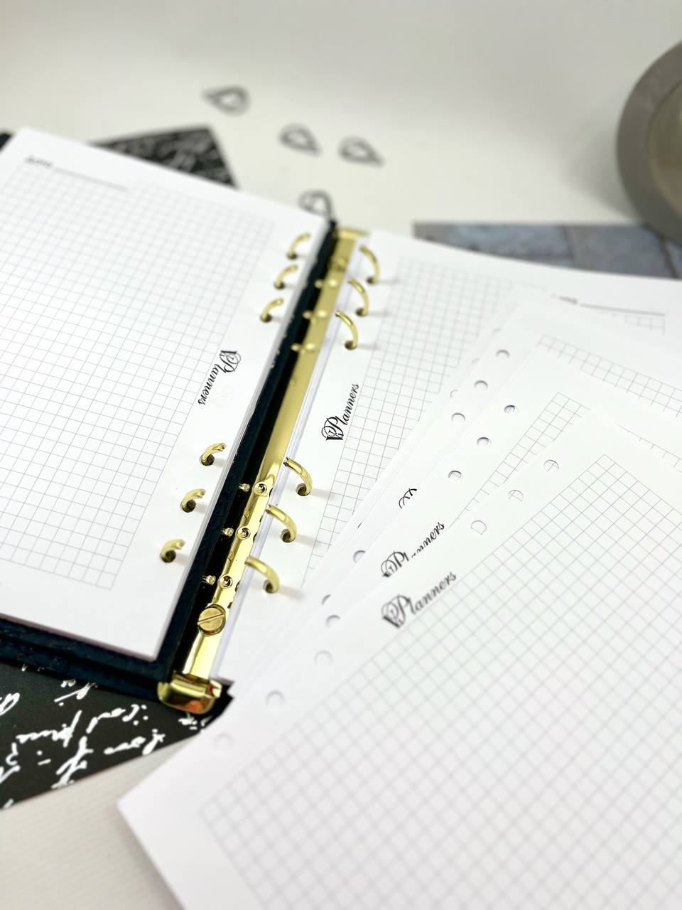 Squared grid planner pages. Printed planner pages, size A5.