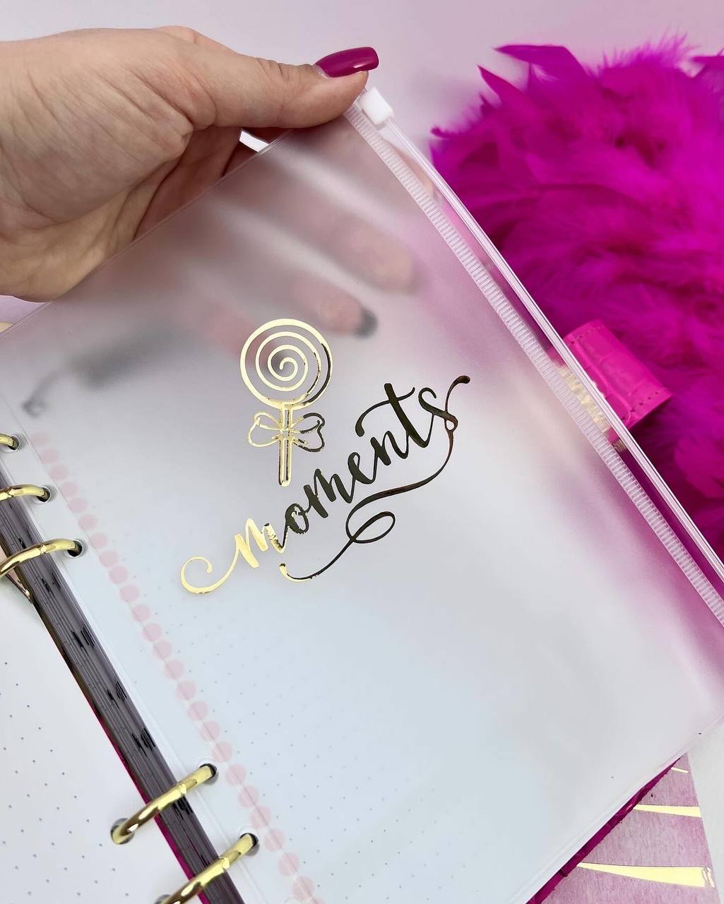 Cyprus, Limassol. Hot pink leather notebook cover A5 with big gold binder. Cover for A4 and A5 documents format.