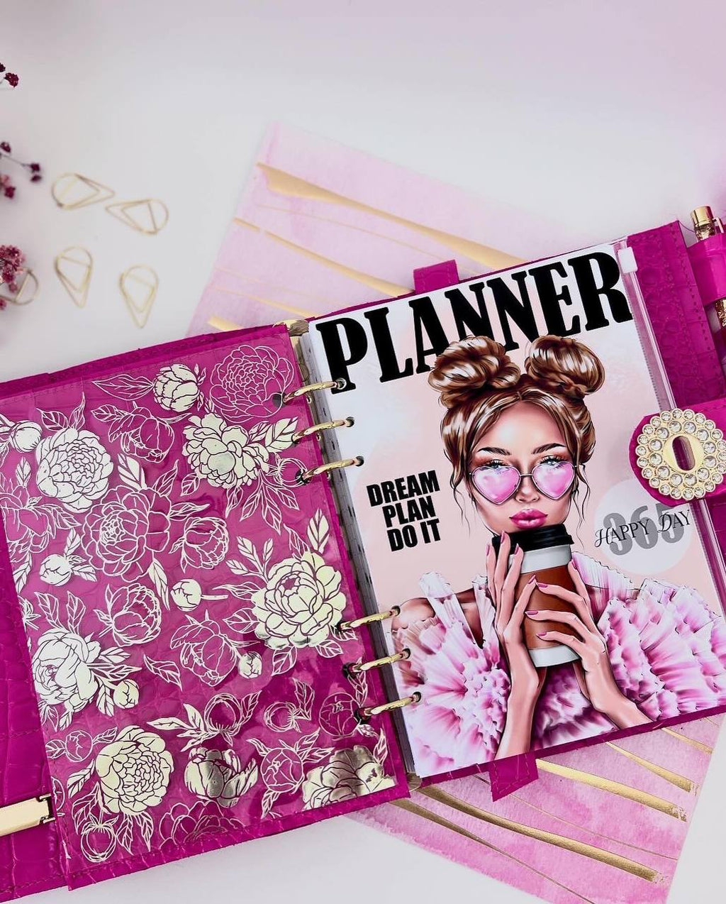 Cyprus, Limassol. Hot pink leather notebook cover A5 with big gold binder. Cover for A4 and A5 documents format.